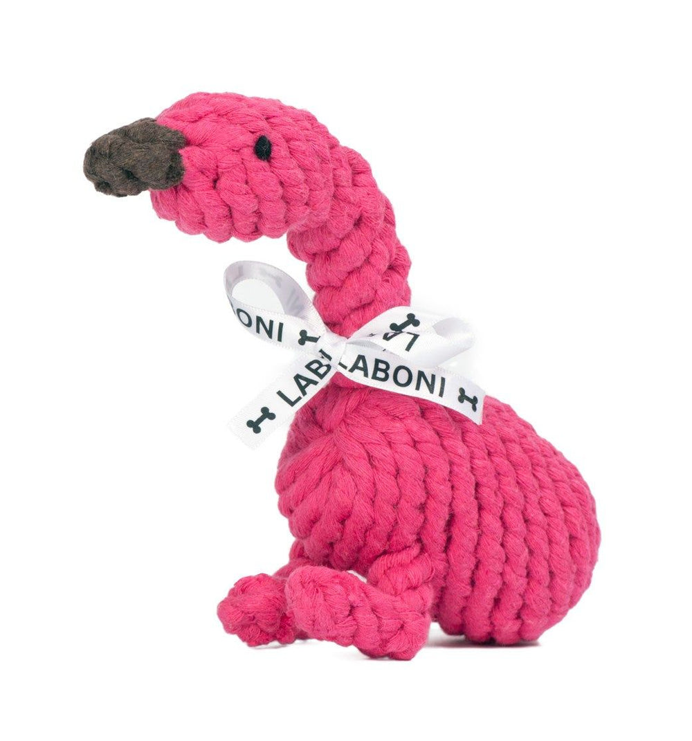 ALT-Text: Pinkes Flamingo-Spielzeug für Hunde mit Schleife und braunem Schnabel, ideal für verspielte Vierbeiner.
