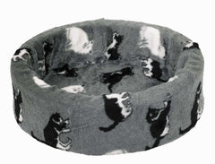 Rundes Plüschbett für Katzen mit grauem Bezug und schwarzen Katzenmotiven, hoher Rand und weiche Liegefläche.