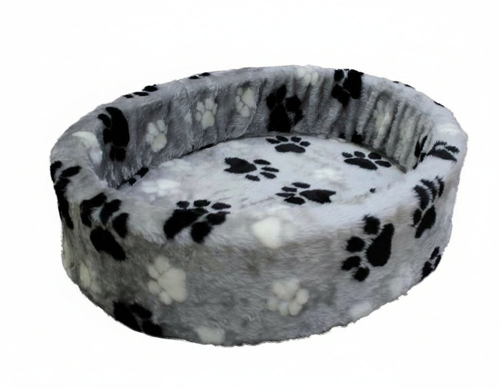 Rundes Plüschbett "Pfote" mit grauem Stoff und dekorativen schwarzen und weißen Pfotenabdrücken, ideal für Tiere.