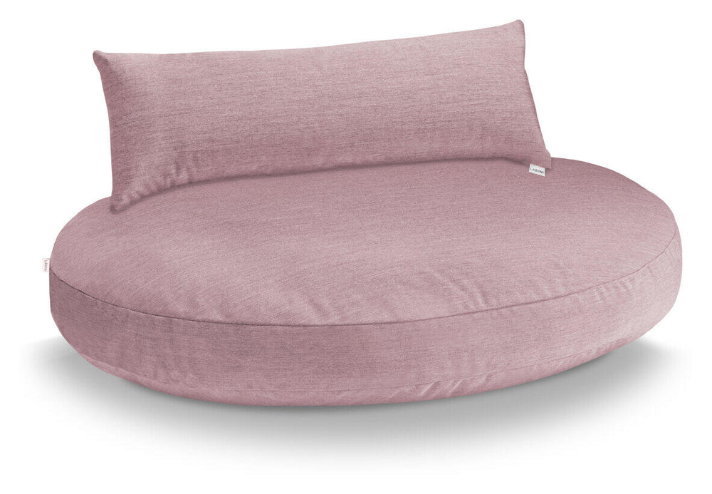 Beiges Lounge-Set mit hoher Rückenlehne und gepolsterter Sitzfläche in sanftem Rosa, ideal für gemütliche Terrasse.