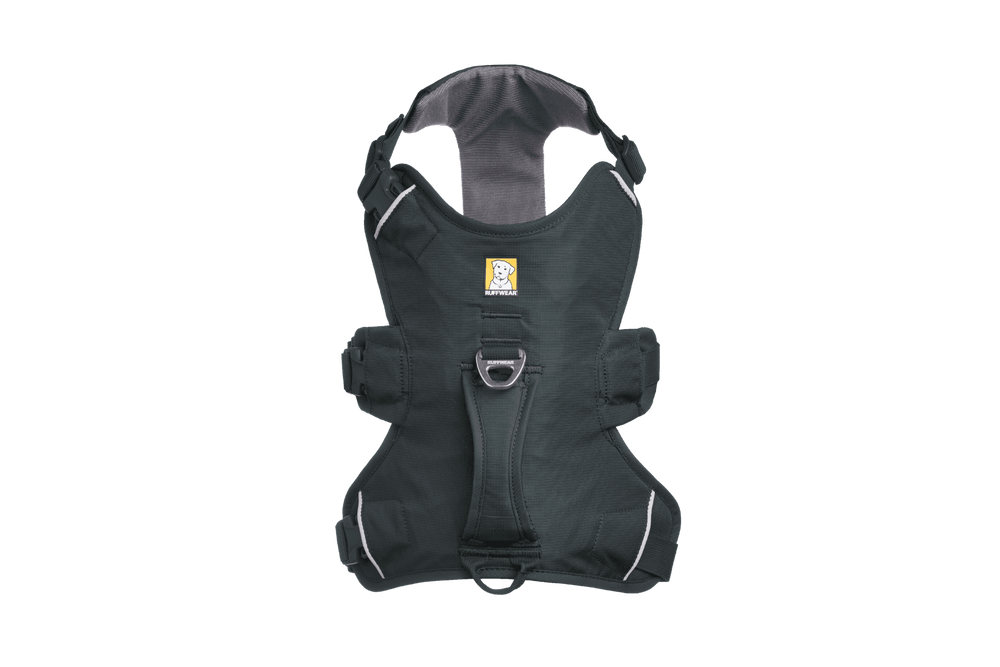 Schwarzes ergonomisches Hundegeschirr mit verstellbaren Riemen und reflektierenden Details für Sicherheit und Komfort.