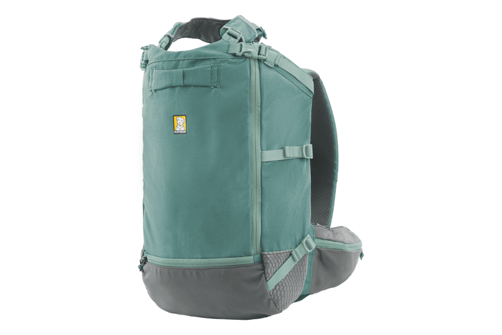 Hitch Hiker™ Hunde-Rucksacktrage in grün-blau mit verstellbaren Gurten und praktischen Fächern für Komfort und Funktionalität.