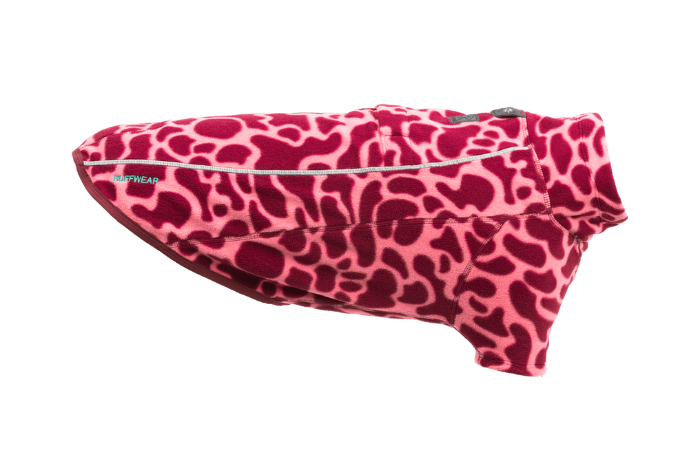 Hundepullover Climate Changer™ aus weichem Material, rosa-gemustert mit hohem Kragen und reflektierendem Streifen.