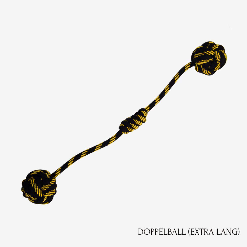 Doppelball Hundespielzeug aus strapazierfähigem Material, verbunden durch ein geflochtenes Seil in Schwarz und Gelb.