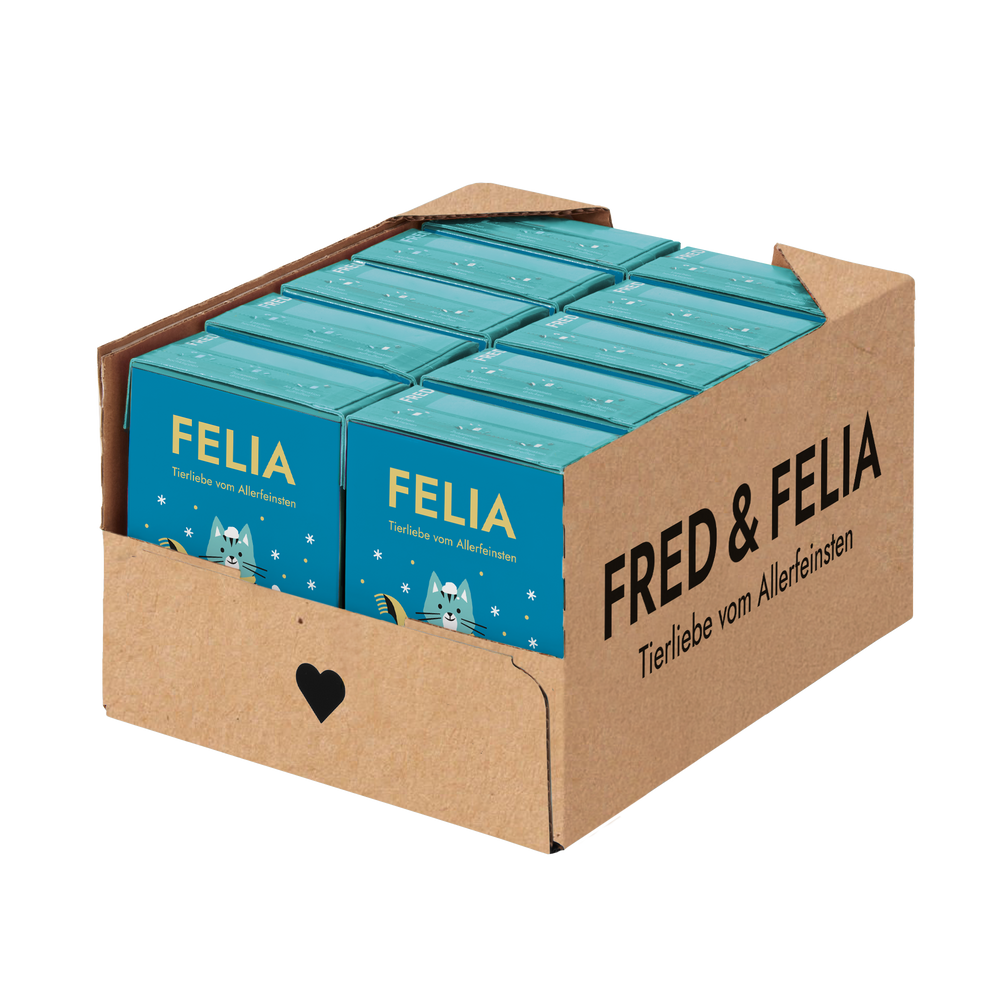 Kartonverpackung des FELIA Winterdrinks für Katzen in Blau mit Tierillustration und "FRED & FELIA" Schriftzug.