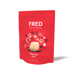 Rote Verpackung von FRED Käsepops Rind mit Herzen und Käsefigur. Snack für Käseliebhaber.
