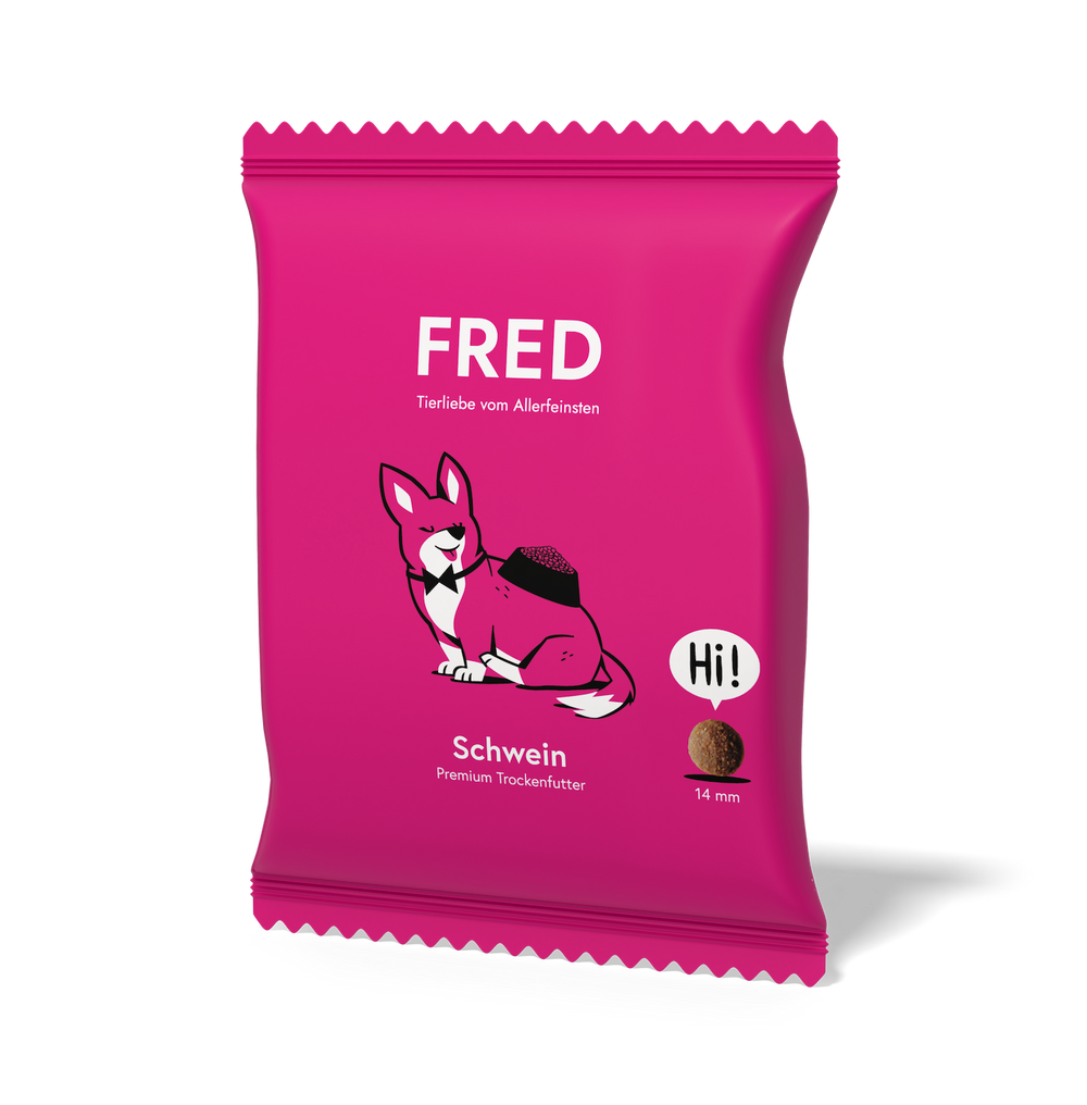 FRED Premium Trockenfutter für Hunde mit Schwein in pinker Verpackung, getreidefrei und nährstoffreich.