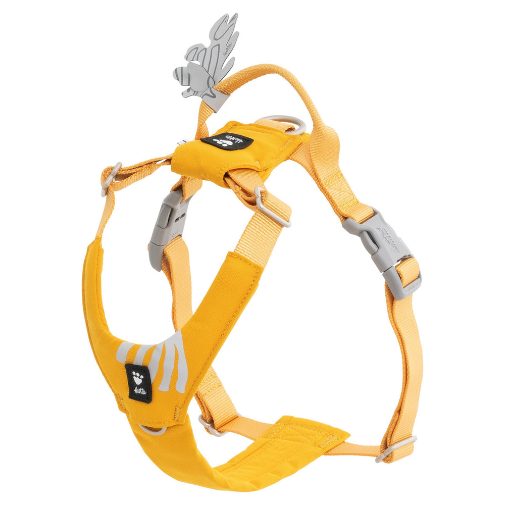 Gelbes Hundegeschirr Seeker aus strapazierfähigem Material mit verstellbaren Gurten und silbernem Haltegriff.