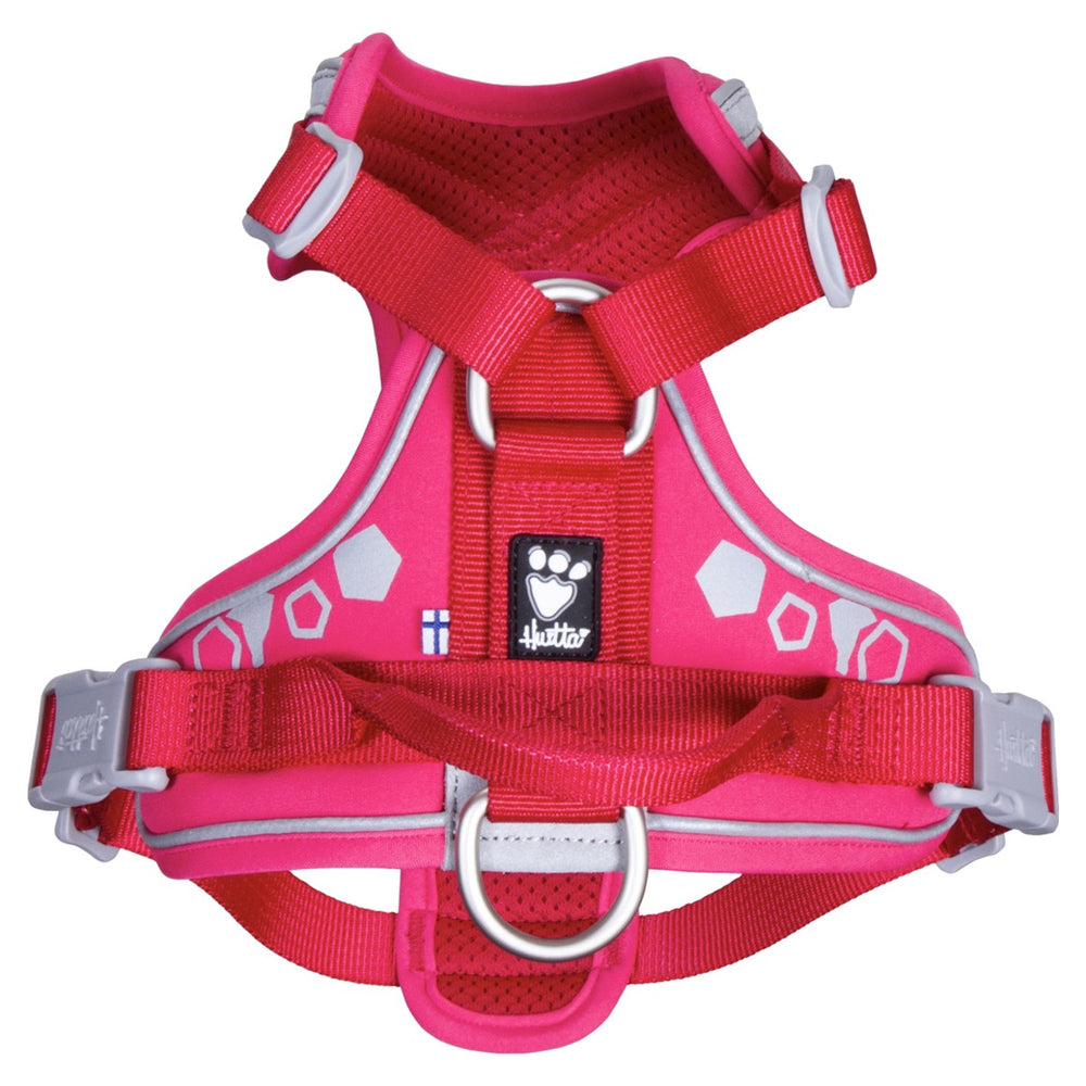 Pinkfarbenes Hundegeschirr Weekend Warrior mit roten Gurten, reflektierenden Details, D-Ring aus Metall, gepolstert, verstellbar.