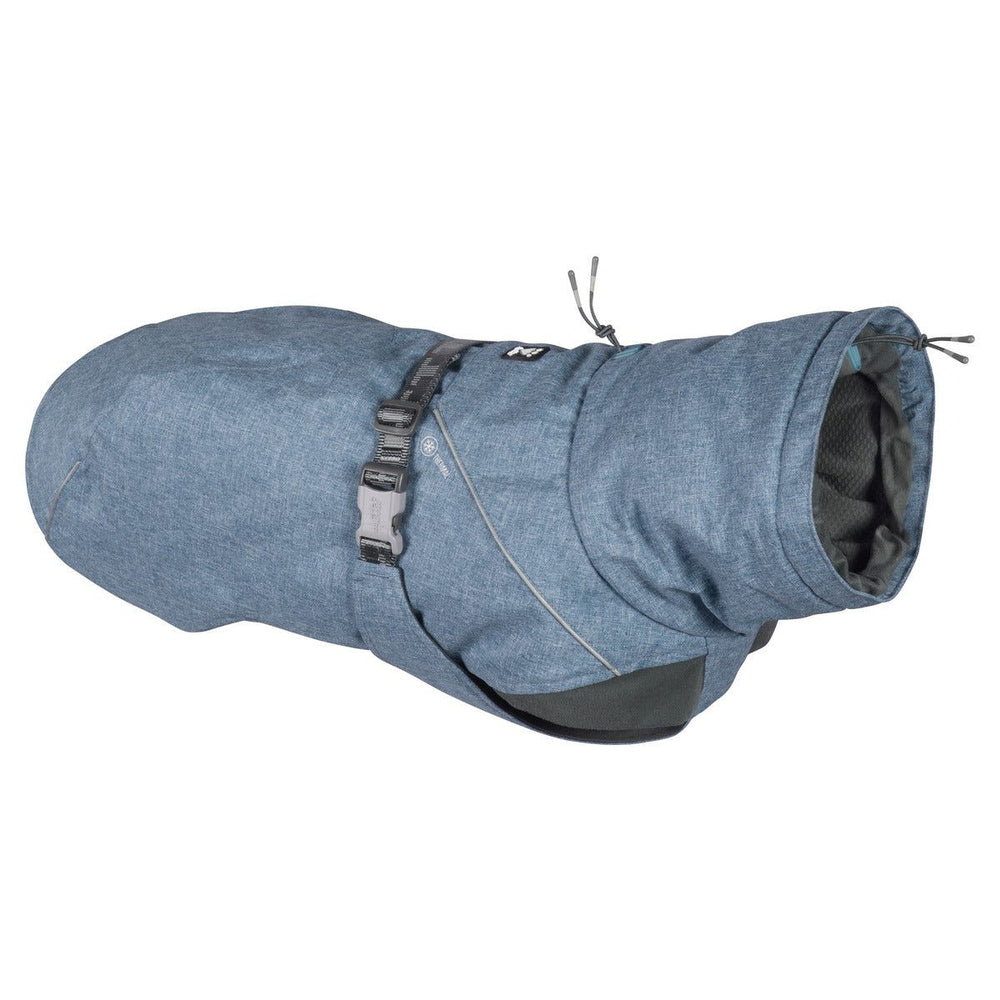 Blaue Hundejacke mit Schnalle, reflektierenden Details und Kordelzügen; weiches Innenfutter; ideal für Expeditionen.