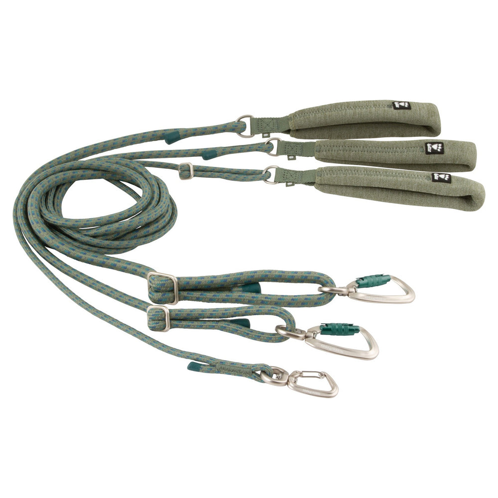Grün-gemusterte, verstellbare Hundeleine mit gepolstertem Griff und Metallkarabiner für sicheren Halt.