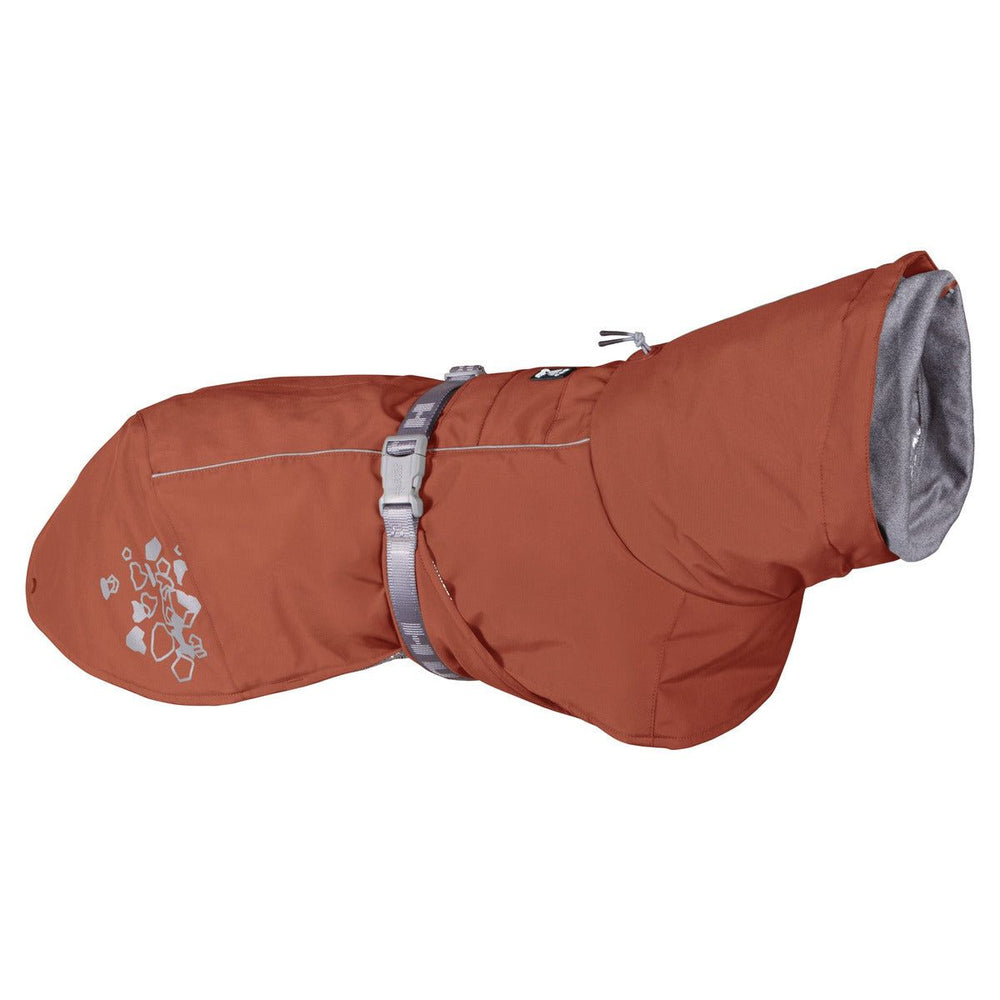 Rotbrauner Hundemantel mit grauem Innenfutter, reflektierendem Design und verstellbarem Klickverschluss für optimalen Schutz im Winter.