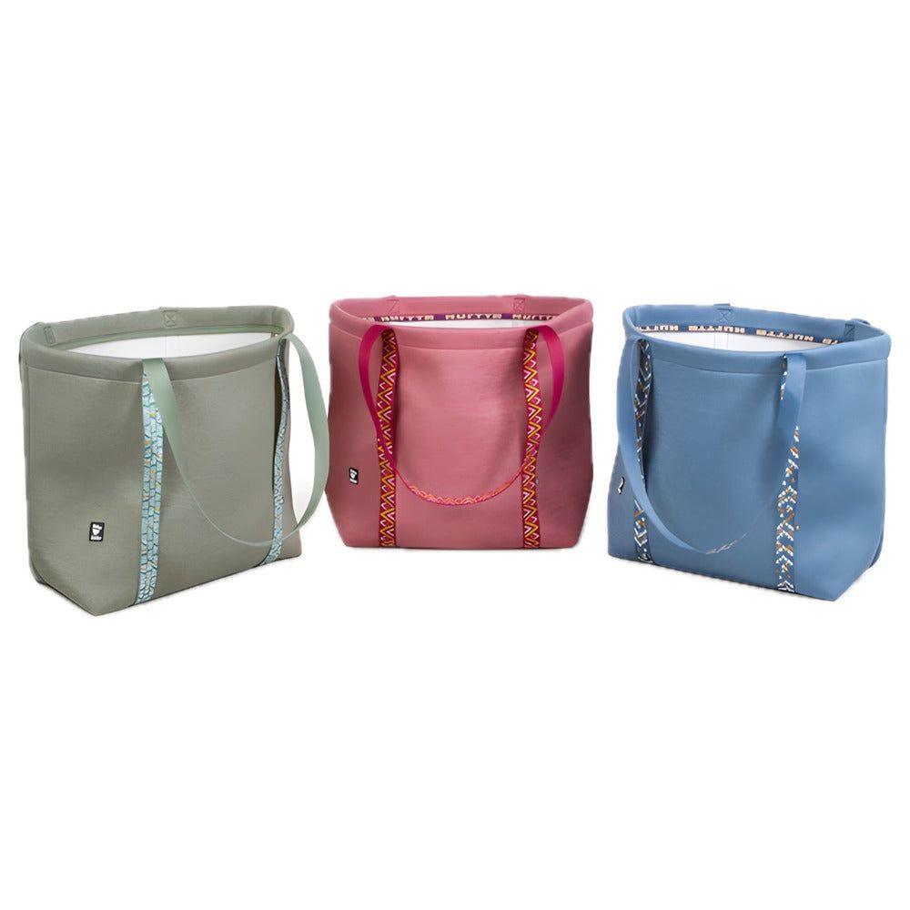 Einkaufstasche Zhero Tote in Grün, Rosa und Blau mit Tragegriffen und Muster, schlichtes rechteckiges Design, abgerundete Ecken.