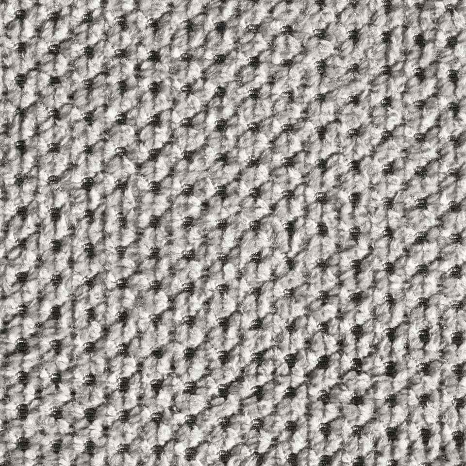 Nahaufnahme des CLASSIC Hundebetts TUDOR mit strukturierter grauer und schwarzer Stoffoberfläche in gewebter Textur.