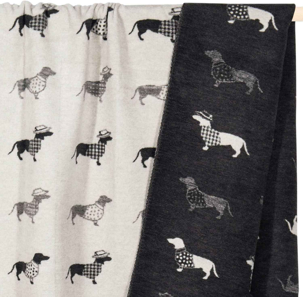Wendedecke TECKEL mit buntem Dackelmotiv, ideal als gemütliche Wohnaccessoire für Hundefreunde.