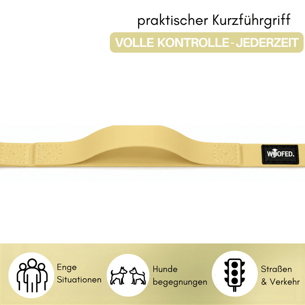 Ergonomischer Kurzführgriff der WOOFLEX® Classic in heller Farbe, ideal für enge Situationen und Hunde-Begegnungen.
