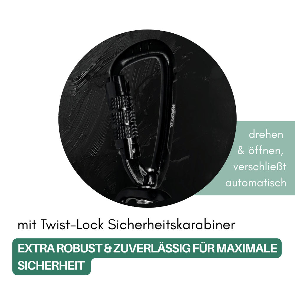 Schwarzer Twist-Lock-Sicherheitskarabiner für Schleppleinen, drehbar und automatisch schließend, robust und sicher.