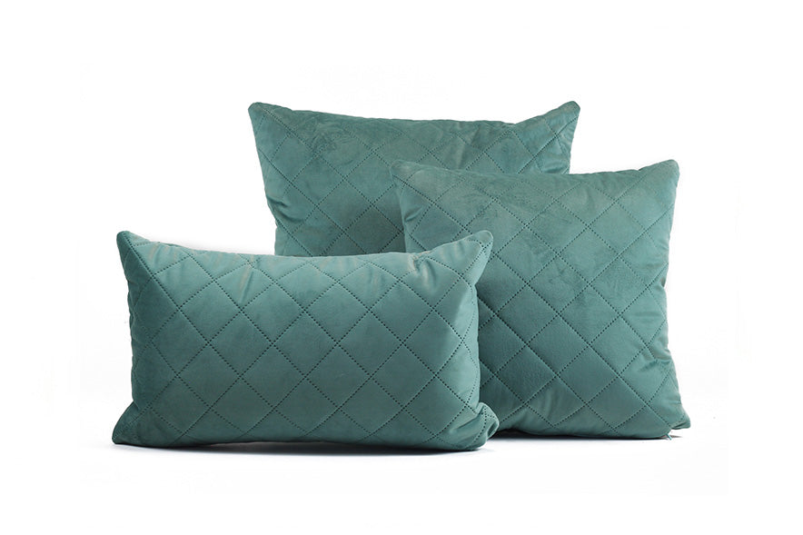 Kissenbezug Caro in sanftem Türkis mit gestepptem Rautenmuster, ideal für gemütliche Wohnräume.