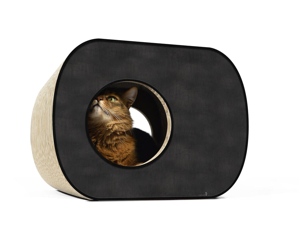 Stilvolles BROCHHAUS JUNIOR Design Katzenhaus mit schwarzer Oberfläche und hellem, geflochtenem Material.