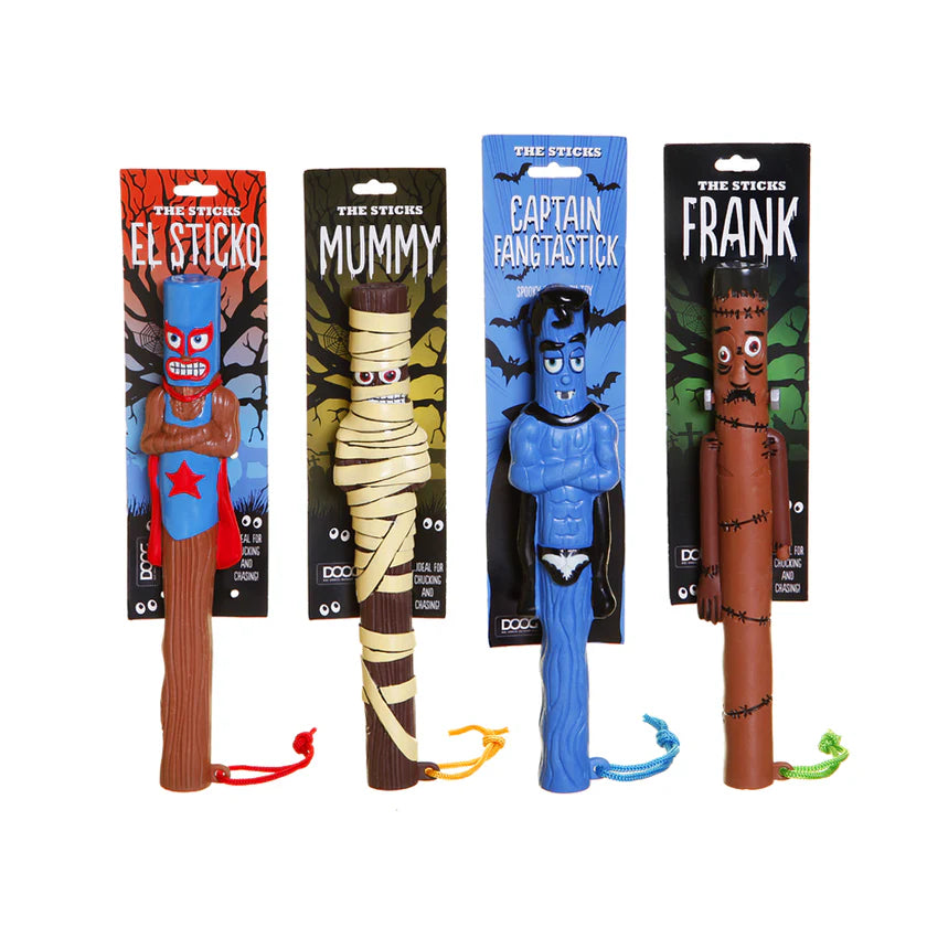 Bunte Monster-Spielzeugfiguren von DOOG: El Sticko (rot) und drei weitere Designs auf Kartenhintergrund.