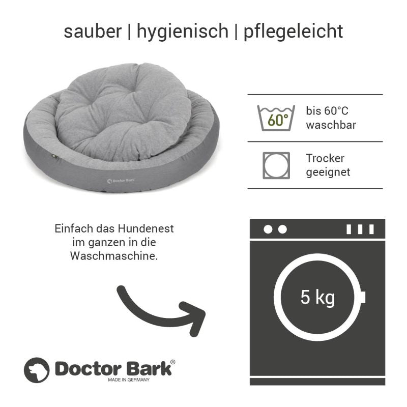 Rundes, graues Hundebett von Doctor Bark, weich, mit hoher Kante, waschbar bis 60 °C und trocknergeeignet.
