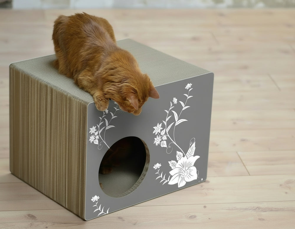 Graue, moderne Katzenhöhle mit floralem Design und Katze auf dem Dach, ideal für stilbewusste Tierhalter.