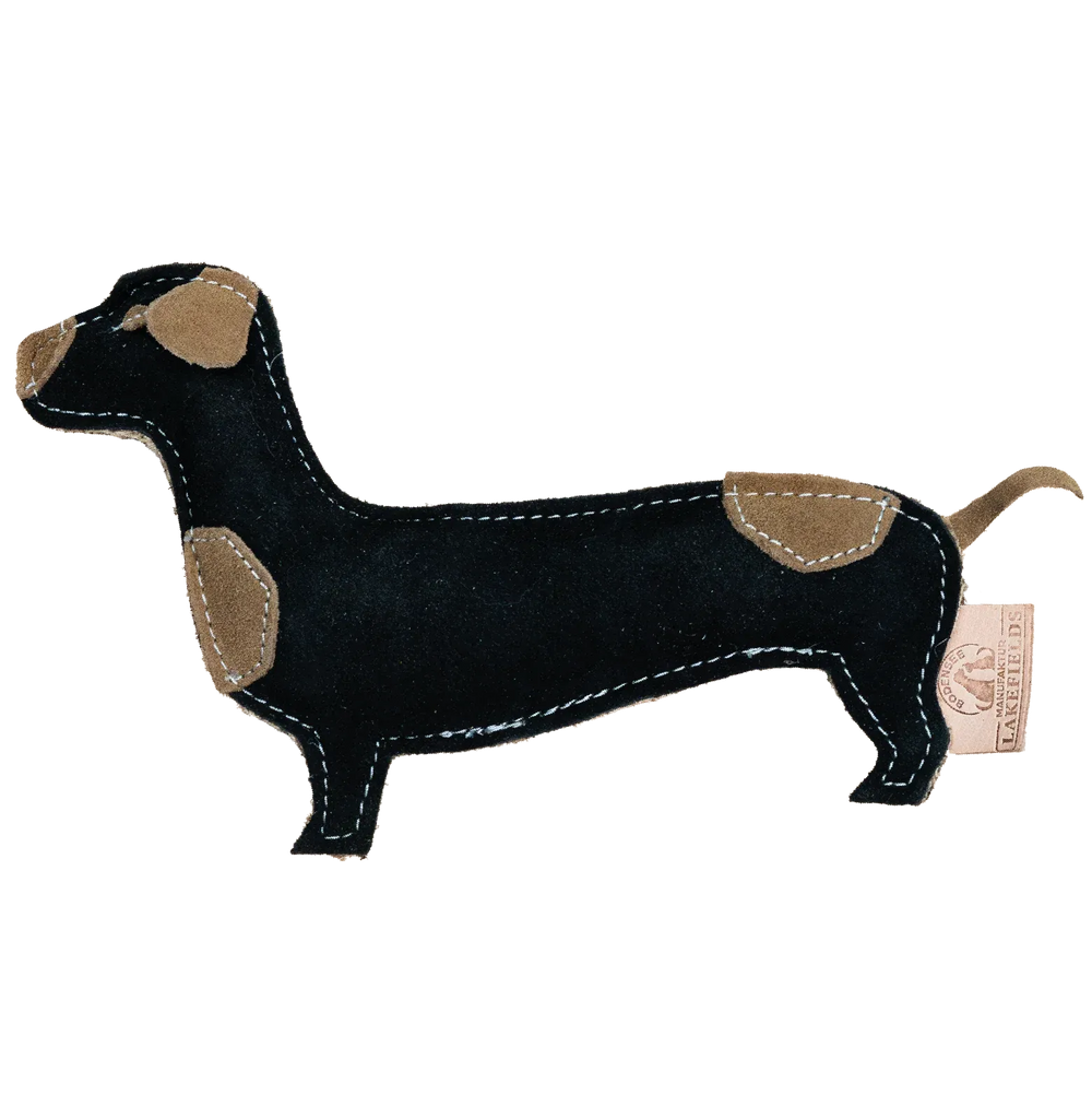 Schwarzes Dackel-Plüschspielzeug aus Wildleder mit braunen Flecken und gestickten Nähten. Ideal für Spiel und Kuschelzeit.