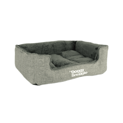 Rechteckiges Hundebett mit grauem Außenmaterial und dunklem, weichem Innenbereich für optimalen Komfort.