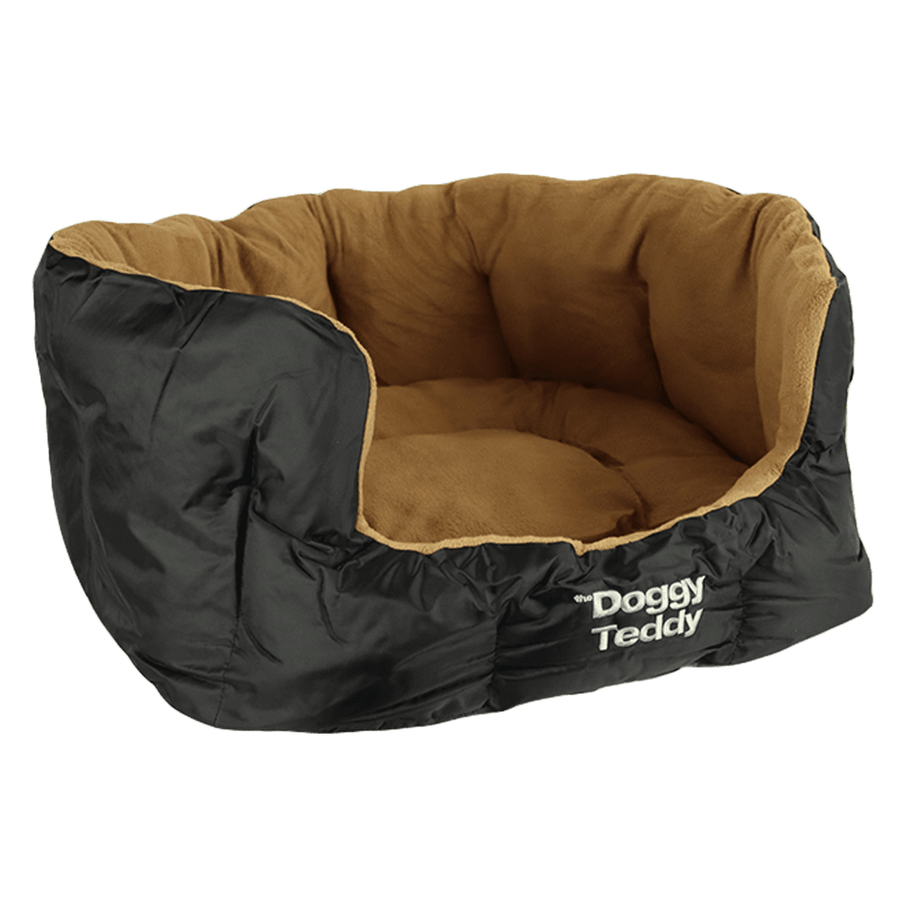 Ovales Hundebett "Doggy Teddy X-Treme" mit schwarzer Außenseite und braunem, weichem Innenleben.