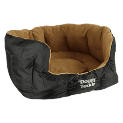 Ovales Hundebett "Doggy Teddy X-Treme" mit schwarzer Außenseite und braunem, weichem Innenleben.
