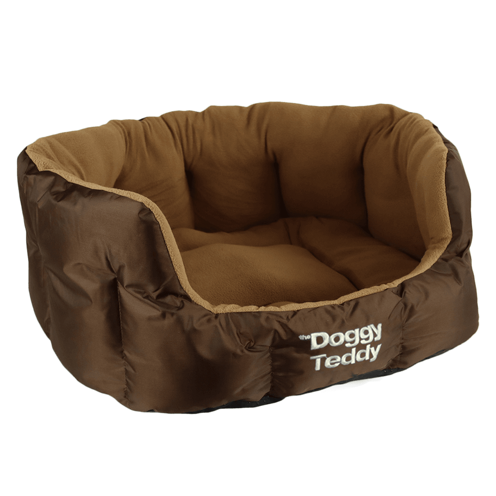 Hundebett Doggy Teddy X-Treme in ovaler Form mit weicher Innenfläche und braunem Außenmaterial.