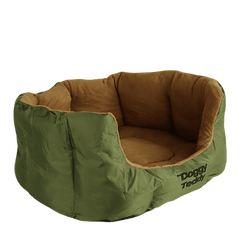 Hundebett in rundem Design, grün mit beiger Innenseite, bietet optimalen Komfort für Ihren Hund.