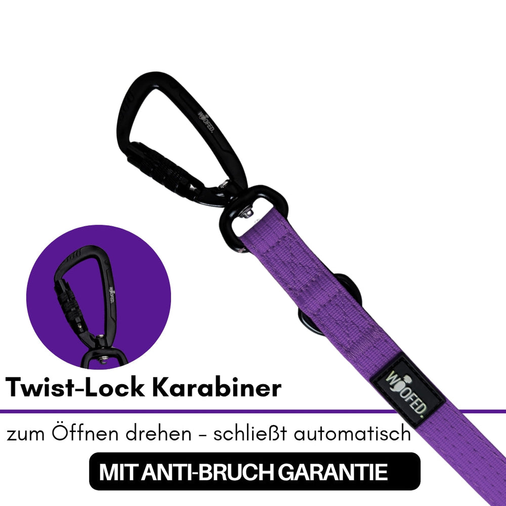 Lila Nylon-Hundeleine mit schwarzem Twist-Lock-Karabiner und "Anti-Bruch Garantie" auf weißem Hintergrund.