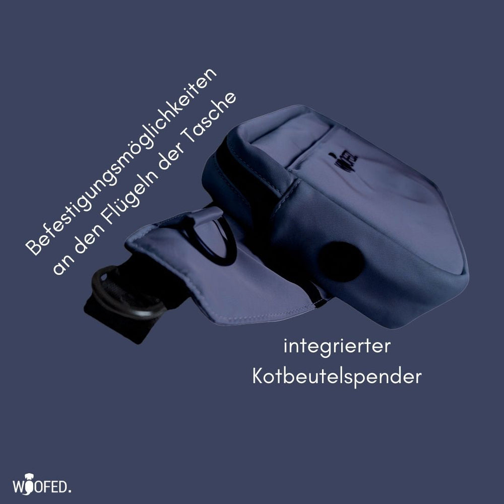 Multifunktionale Gassitasche in Blau mit Befestigungsmöglichkeiten und integriertem Kotbeutelspender.