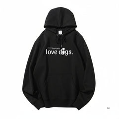 Unisex Hoodie mit Aufdruck "F*** humans love dogs", schwarz mit Kapuze und Kängurutasche, ideal für Hundeliebhaber.