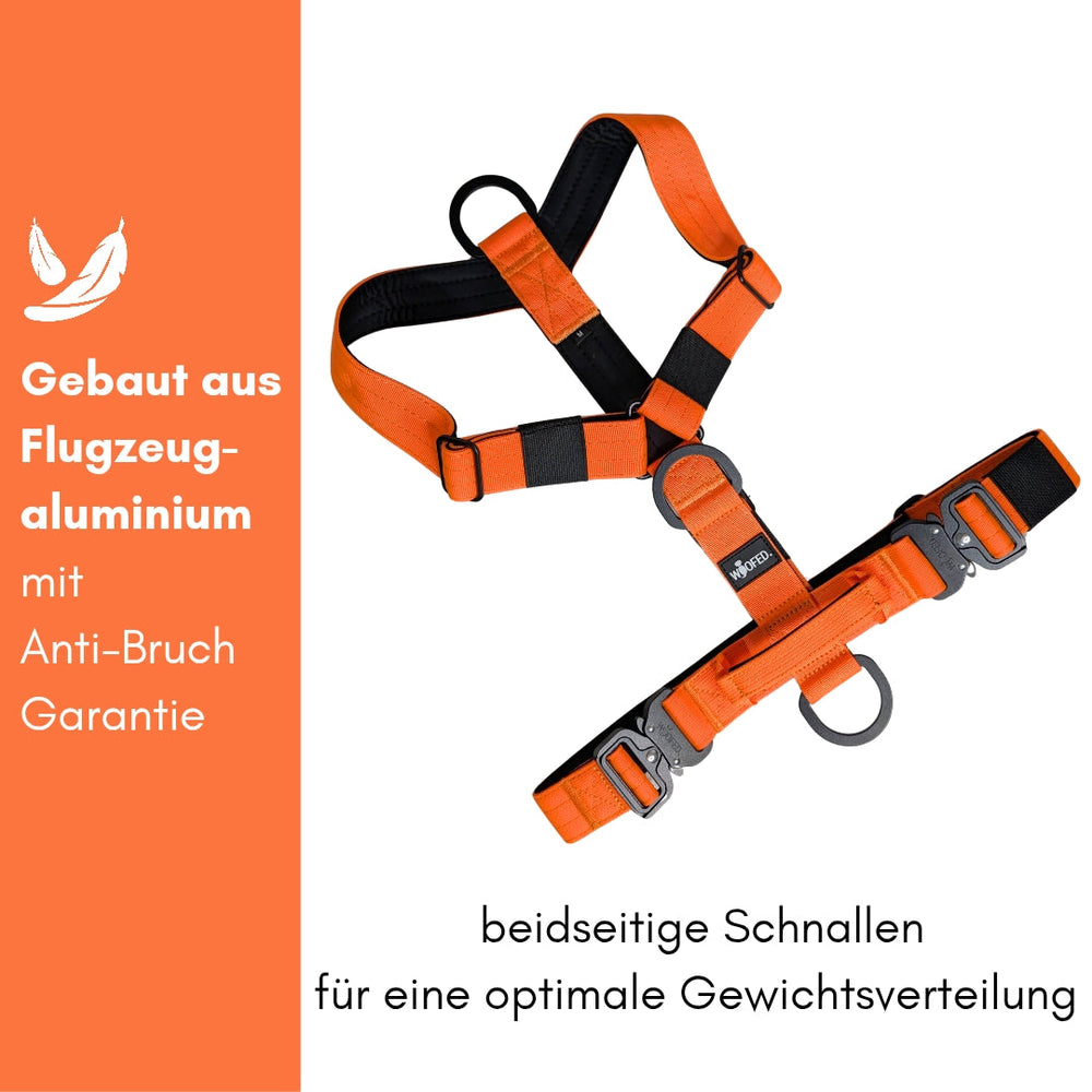 Orangefarbenes Y-Hundegeschirr aus Flugzeugaluminium mit Griff und Anti-Bruch-Garantie für optimale Gewichtverteilung.