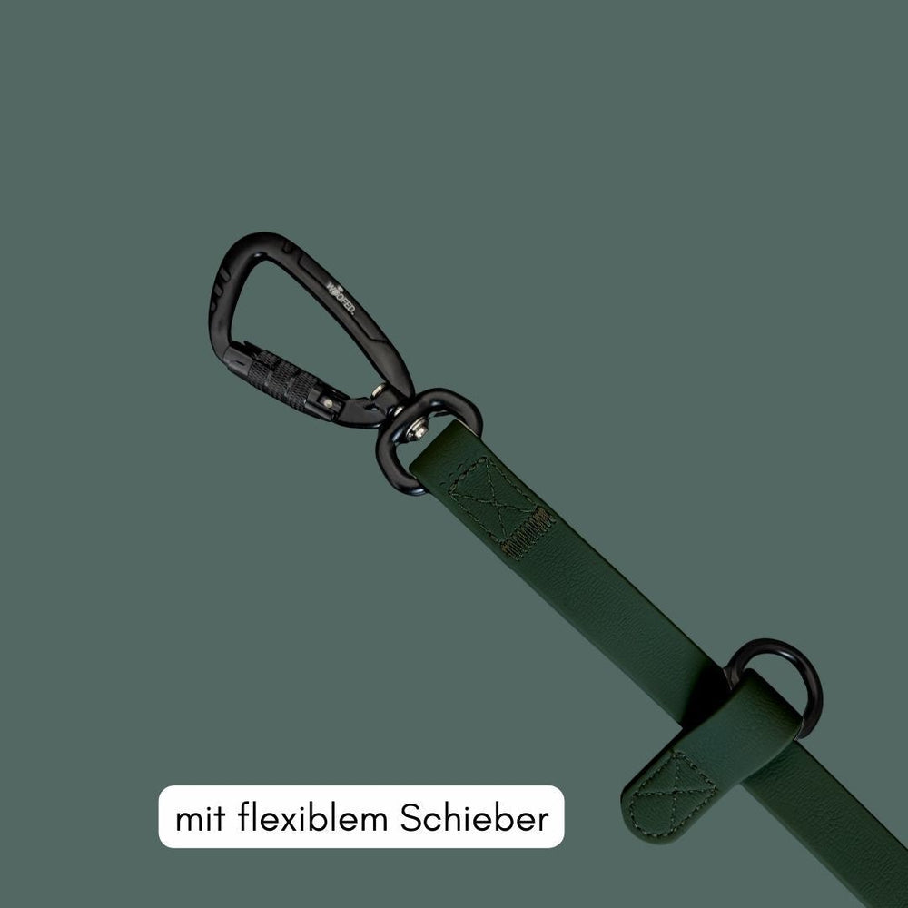 Grüne WOOFLEX® Pro Umhängeleine für Hunde mit flexiblem Schieber und schwarzem Karabinerhaken, robust und outdoor-tauglich.