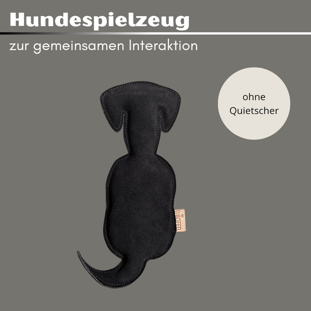 Hundespielzeug WOOFED. in Hund-Form, robust und ergonomisch für aktive Spiele mit Hunden, modernes Design auf grauem Hintergr