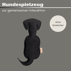Hundespielzeug WOOFED. in Hund-Form, robust und ergonomisch für aktive Spiele mit Hunden, modernes Design auf grauem Hintergr