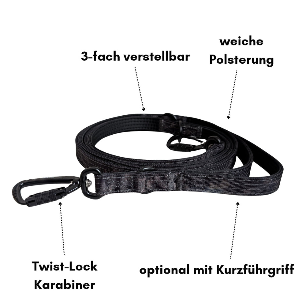 Verstellbares schwarzes Hundehalsband aus Nylon mit Polsterung und Twist-Lock Karabiner für optimale Sicherheit.
