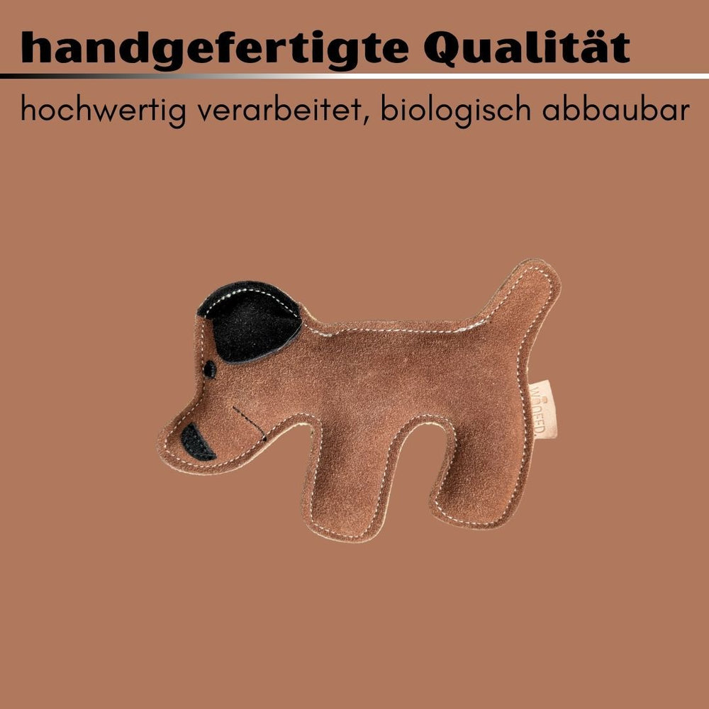 Braunes, umweltfreundliches Hundespielzeug aus hochwertigem, handgefertigtem Material vor einfarbigem Hintergrund.