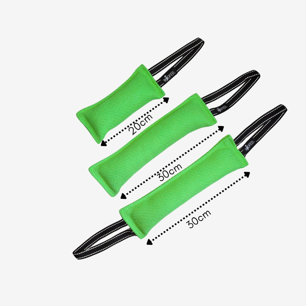 Hundespielzeug Beißwurst in verschiedenen Größen und Farben mit schwarzen Griffen für Hunde, ideal für Training und Spiel.