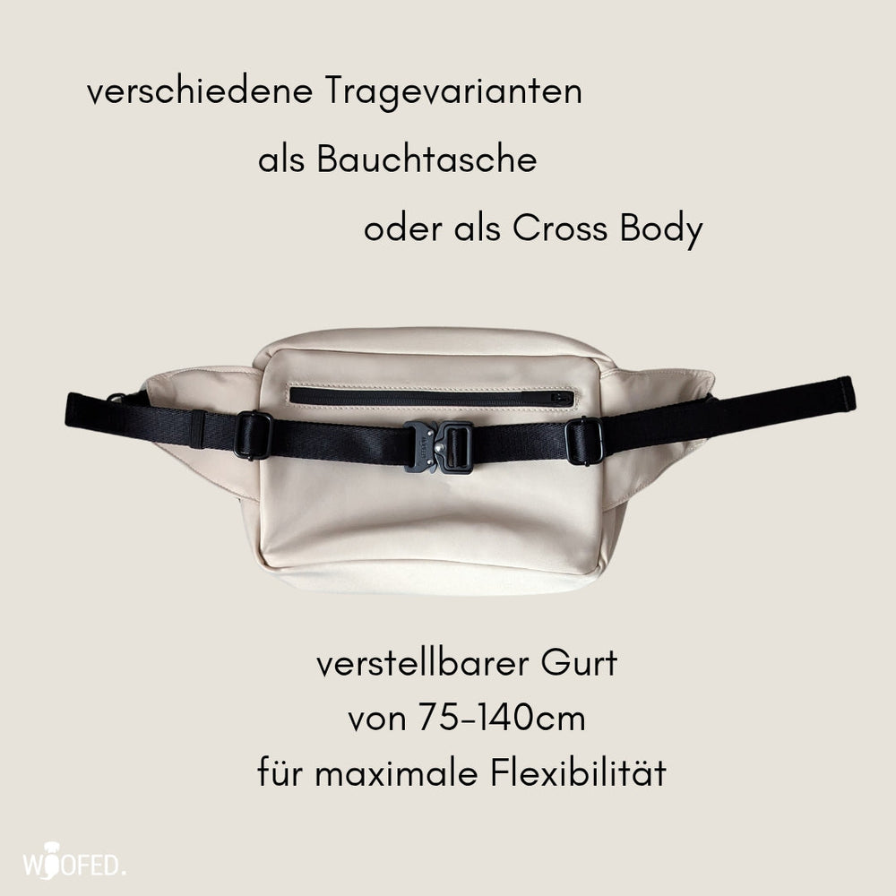 Multifunktionale Gassitasche in neutraler Farbe, kombinierbar als Bauchtasche oder Schultertasche mit verstellbarem Gurt.