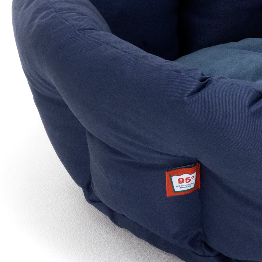Gepolsterter, runder, blauer Sessel von Doctor Bark für Hunde, ideal für Komfort und Entspannung.
