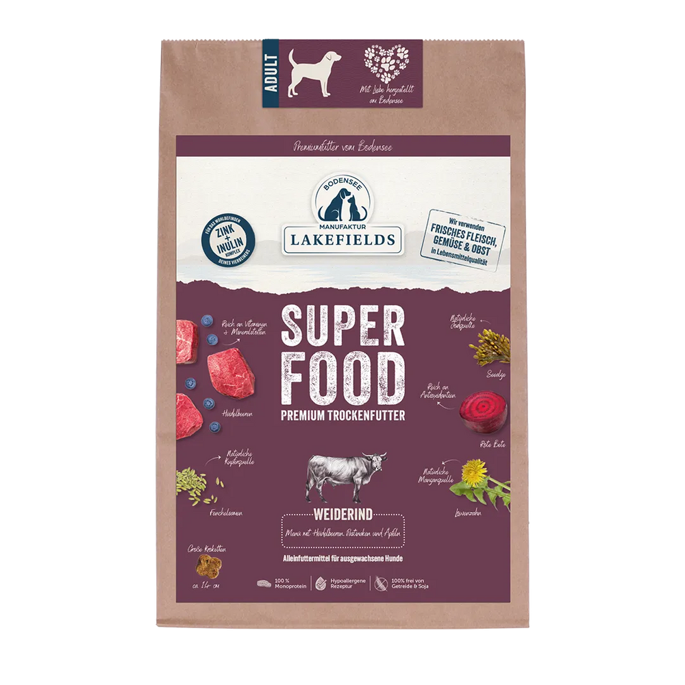 Verpackung von Lakefields Trockenfutter SUPERFOOD Rind für Hunde, braun mit lila Akzenten und appetitlichen Zutatenbildern.