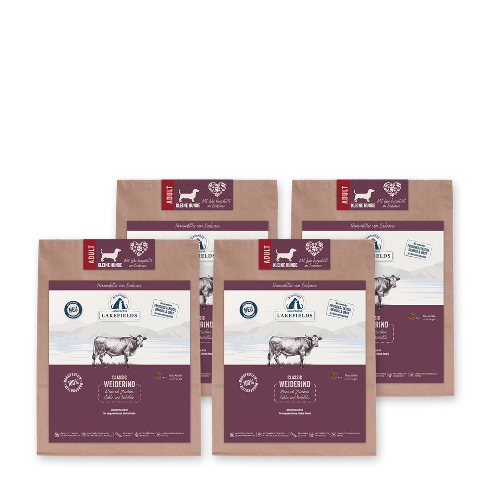 "Packungen des Lakefields Hundefutters SUPERFOOD Rind für erwachsene Mini-Hunde auf braunem Kraftpapier."