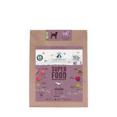 Verpackung von Lakefields Superfood Rind für Welpen, braun mit buntem Aufkleber und Bildern frischer Zutaten.