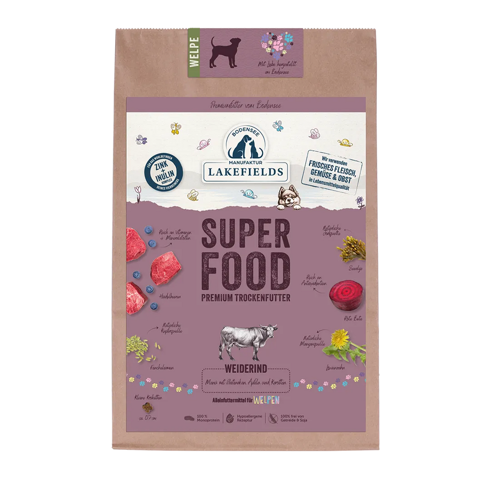 Verpackung von Lakefields SUPERFOOD Trockenfutter für Welpen mit bunten Zutaten und Hundemotiv.