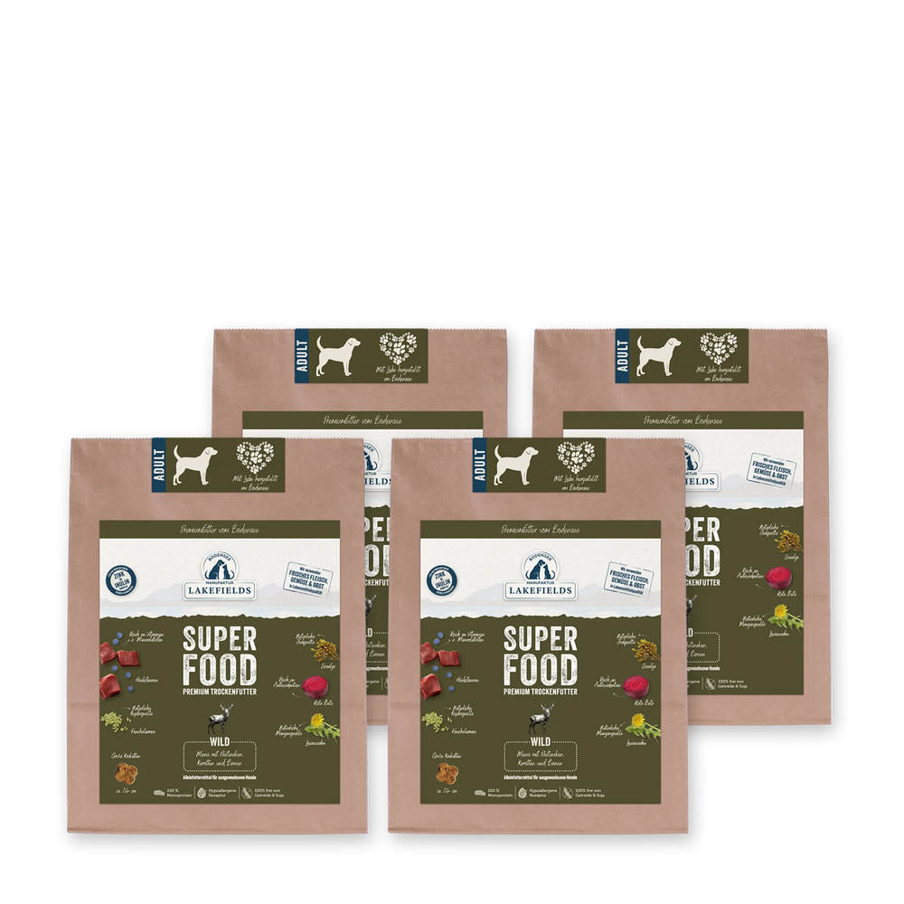 Verpackungen von Lakefields Trockenfutter SUPERFOOD Wild für Hunde, braun mit Inhaltsstoffen und Hundebild.