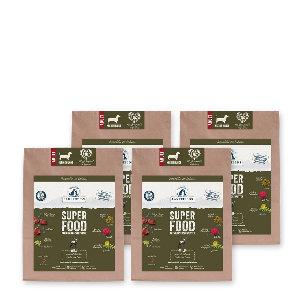 Vier Packungen Trockenfutter "SUPERFOOD Wild" von Lakefields für erwachsene Hunde, braun mit ansprechendem Design.